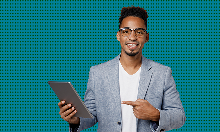 Man pointing at tablet after reading the State of digital learning report