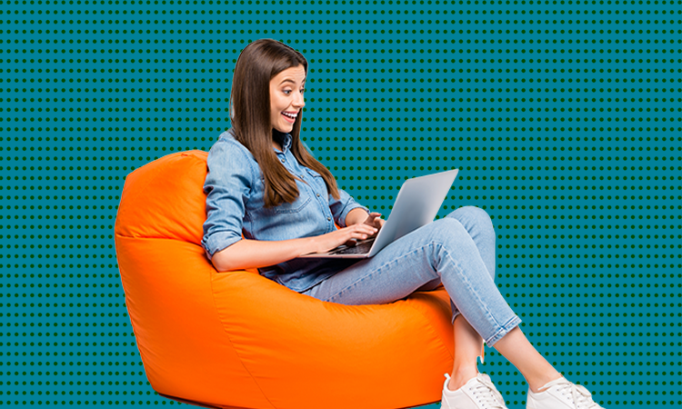 Woman on beanbag with laptop - creating quick and quality elearning